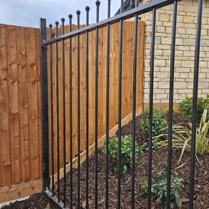 Metal fence and gate installation in Peterborough, Cambridgeshire. Low maintenance fencing. 